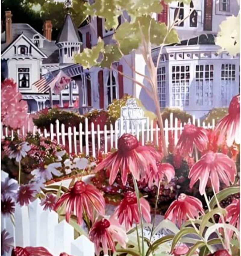 Pink coneflowers in front of white picket fence and old two-story white home