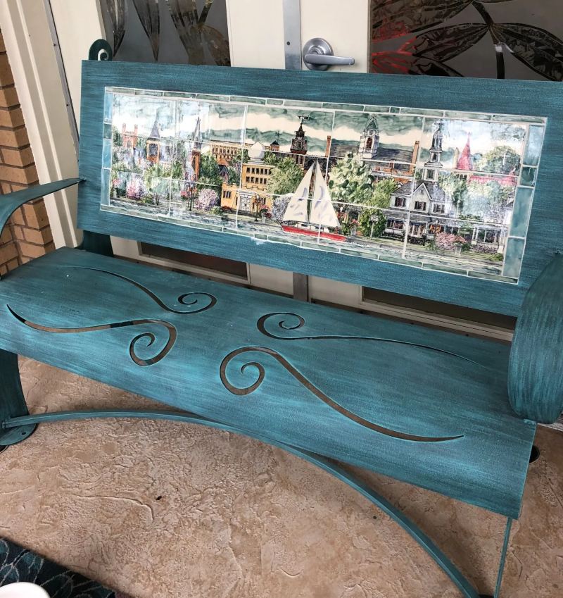 Blue bench with handmade pottery tiles