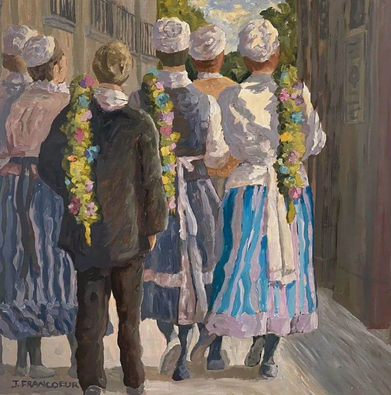 Group of villagers celebrating wedding on stone street